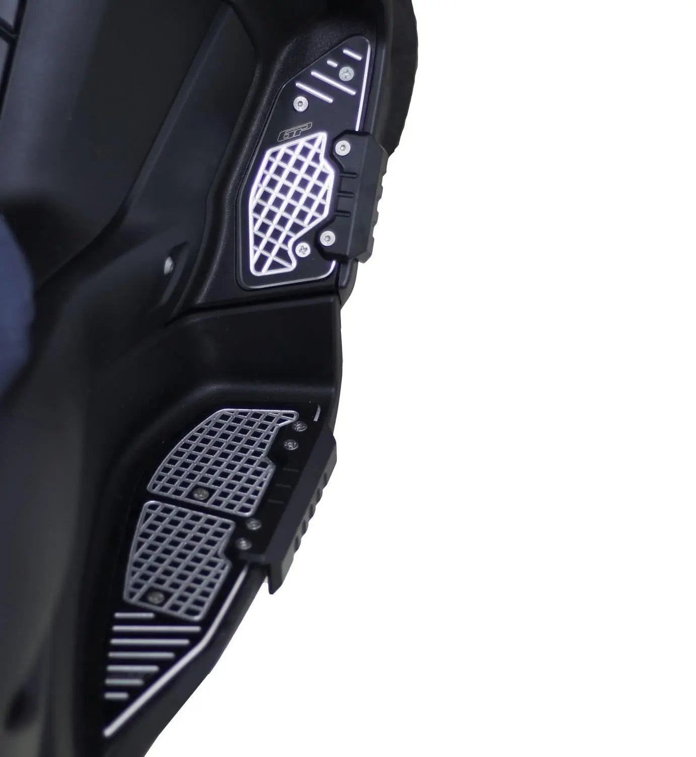 Close-up view of Yamaha XMAX footrest pads showcasing sleek design